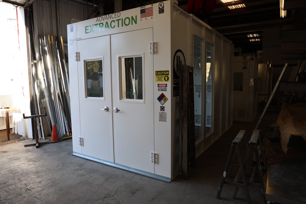 Advanced Extraction Labs Mega Series booth in white with 8x15 sizing